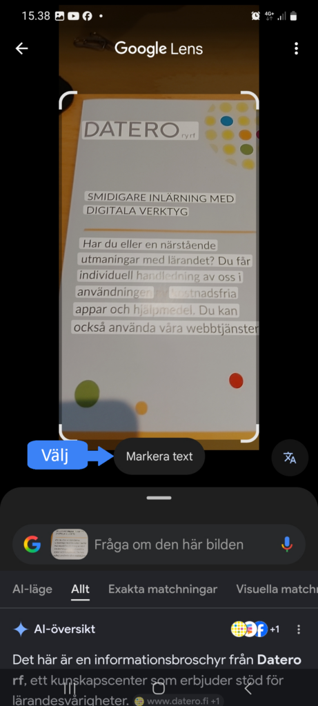 Text som identifierats av Google Lens visas markerad. Tryck på knappen ”Välj text” för fler alternativ.